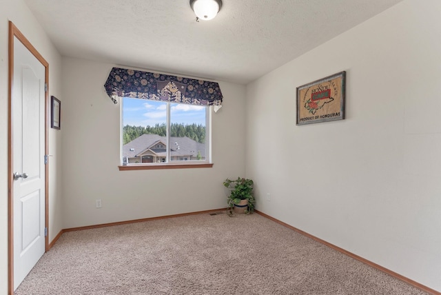 12919 E 39th Ln, Spokane Valley, WA 99206 - empty room with carpet floors and a textured ceiling