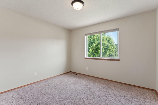 12919 E 39th Ln, Spokane Valley, WA 99206 - carpeted spare room featuring baseboards