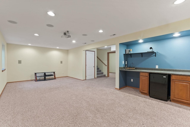 12919 E 39th Ln, Spokane Valley, WA 99206 - indoor wet bar featuring refrigerator, light carpet, stairs, and recessed lighting