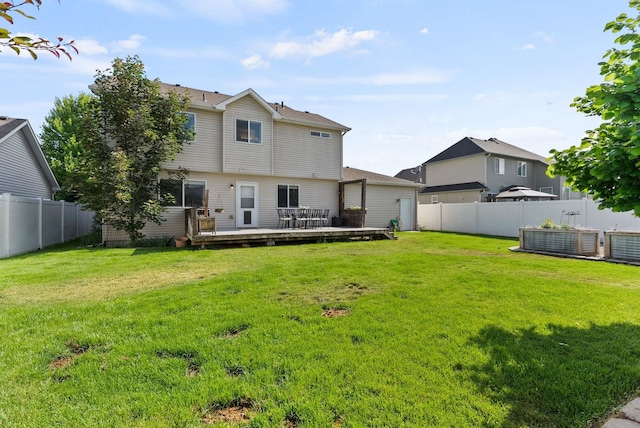 12919 E 39th Ln, Spokane Valley, WA 99206 - back of house featuring a fenced backyard and a deck