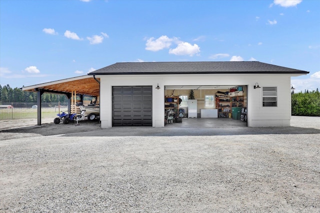 4669 Williams Valley Rd Unit D, Clayton, WA 99110 - garage featuring a detached garage and fridge