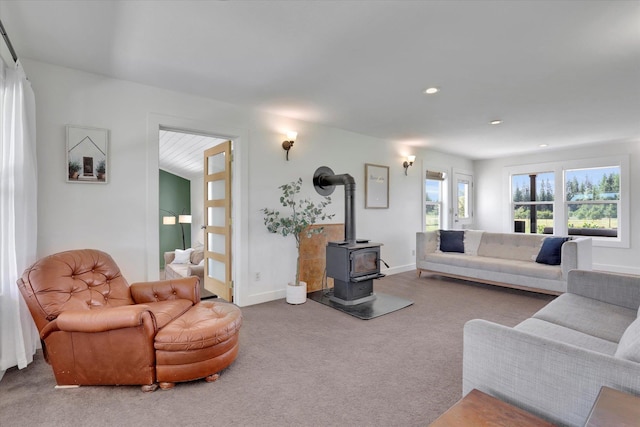 4669 Williams Valley Rd Unit D, Clayton, WA 99110 - living room with a wood stove, carpet flooring, and recessed lighting
