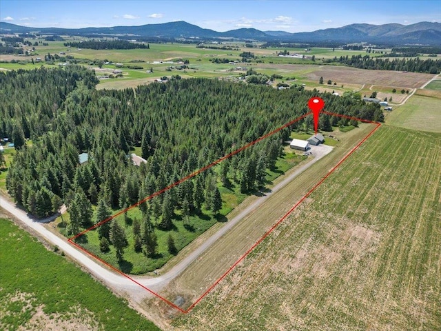 34225 N Arlington Ln, Deer Park, WA 99006 - overview of rural landscape with a mountain backdrop and property parcel outlined