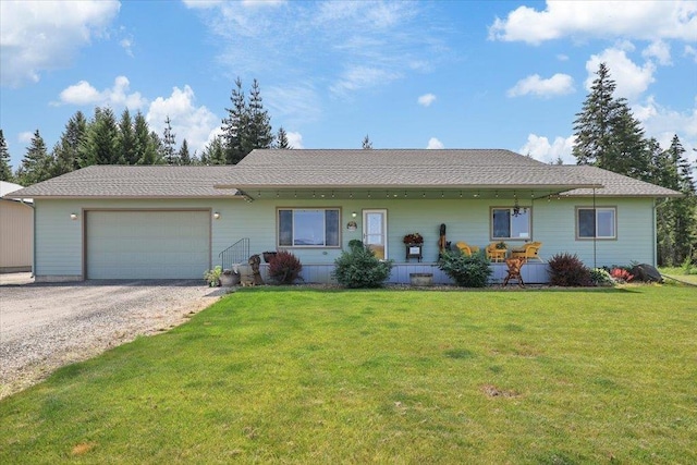 34225 N Arlington Ln, Deer Park, WA 99006 - view of front of house featuring an attached garage, gravel driveway, and a front yard
