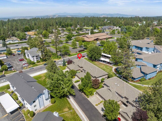 3001 S Winthrop Ln, Spokane, WA 99203 - aerial view of residential area featuring a forest and mountains