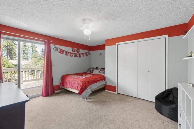 3114 W 20th Ave, Spokane, WA 99224 - carpeted bedroom with access to outside, a textured ceiling, and a closet