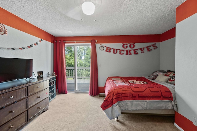 3114 W 20th Ave, Spokane, WA 99224 - bedroom featuring access to outside, a textured ceiling, carpet floors, and a ceiling fan
