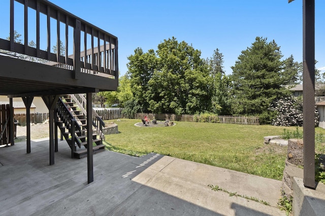 3114 W 20th Ave, Spokane, WA 99224 - fenced backyard featuring a patio, stairs, and a wooden deck