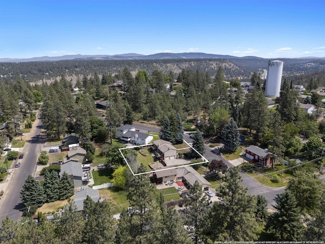 3114 W 20th Ave, Spokane, WA 99224 - aerial view of property and surrounding area featuring property boundaries highlighted and a mountainous background