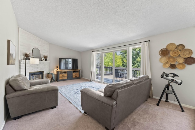 3114 W 20th Ave, Spokane, WA 99224 - living room featuring a textured ceiling, lofted ceiling, a brick fireplace, and carpet