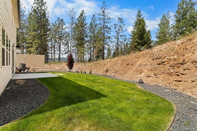 12413 E Dickens Ln, Spokane Valley, WA 99206 - view of grassy yard featuring a patio area