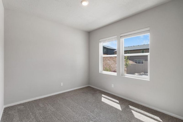 12413 E Dickens Ln, Spokane Valley, WA 99206 - empty room featuring healthy amount of natural light and carpet flooring