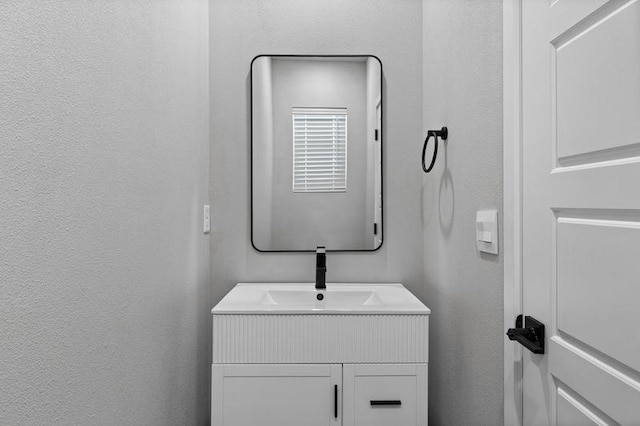 12413 E Dickens Ln, Spokane Valley, WA 99206 - bathroom with vanity and a textured wall