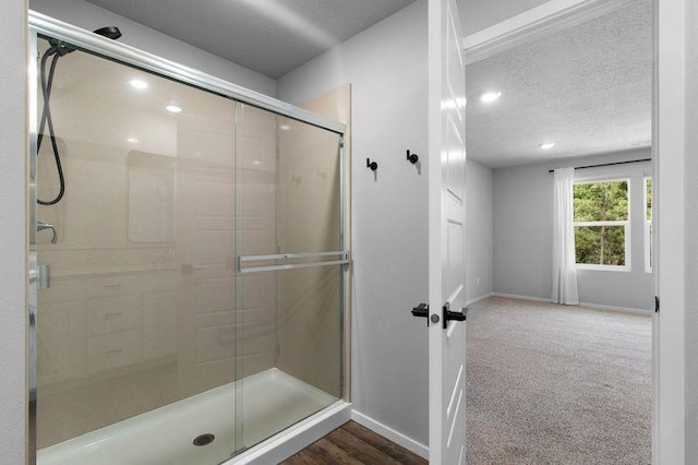 12413 E Dickens Ln, Spokane Valley, WA 99206 - bathroom featuring a stall shower, a textured ceiling, and recessed lighting