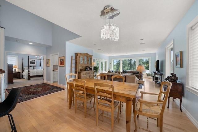 2605 S Cherrytree Ln, Spokane, WA 99203 - dining area featuring a chandelier and light wood finished floors