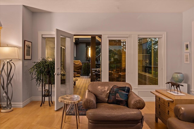 2605 S Cherrytree Ln, Spokane, WA 99203 - sitting room with light wood-style floors and french doors