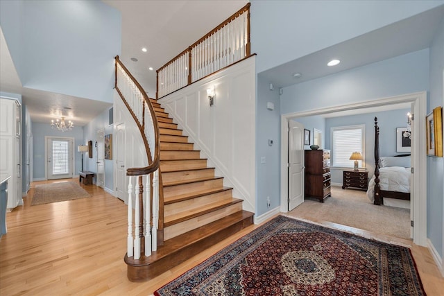 2605 S Cherrytree Ln, Spokane, WA 99203 - entrance foyer with a chandelier, stairs, light wood finished floors, recessed lighting, and a high ceiling