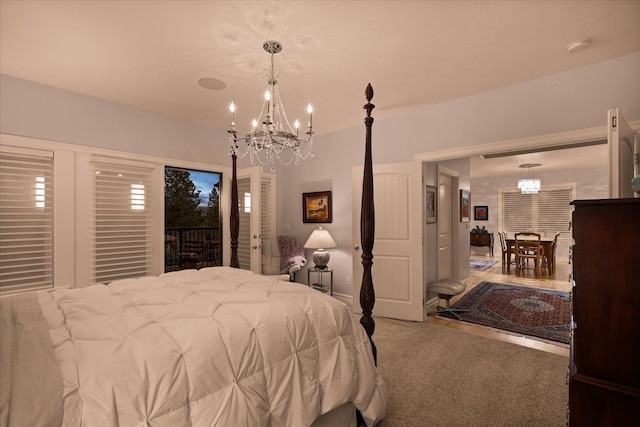 2605 S Cherrytree Ln, Spokane, WA 99203 - carpeted bedroom with a chandelier and access to exterior