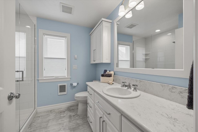 2605 S Cherrytree Ln, Spokane, WA 99203 - full bathroom with a stall shower, vanity, marble finish floors, and heating unit