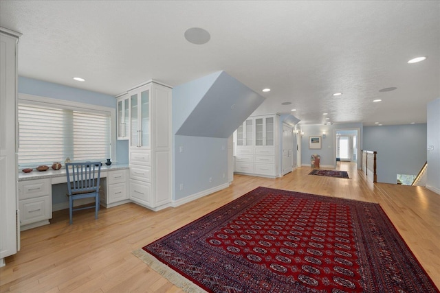 2605 S Cherrytree Ln, Spokane, WA 99203 - additional living space featuring built in study area, light wood-style flooring, and recessed lighting