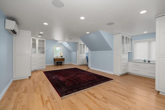 2605 S Cherrytree Ln, Spokane, WA 99203 - bonus room featuring an AC wall unit, light wood-style floors, and recessed lighting