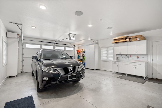 2605 S Cherrytree Ln, Spokane, WA 99203 - garage featuring a garage door opener and recessed lighting