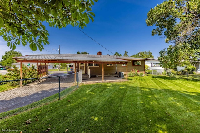 10914 E 7th Ave, Spokane Valley, WA 99206 - rear view of property with a chimney