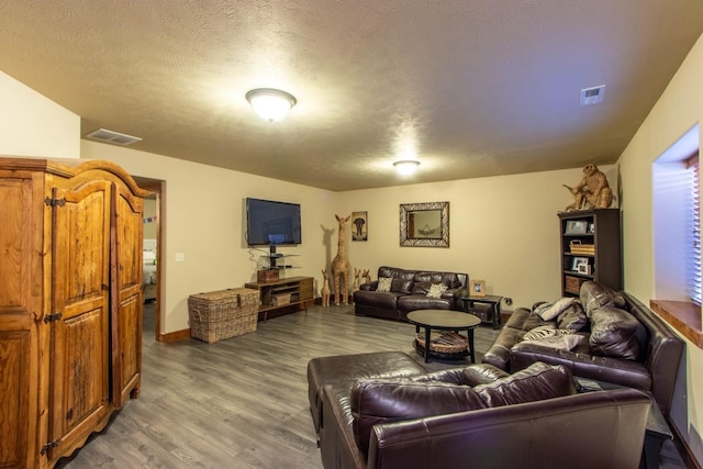 1119 N River Ridge Blvd, Spokane, WA 99224 - living area with wood finished floors and a textured ceiling