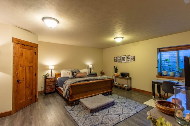 1119 N River Ridge Blvd, Spokane, WA 99224 - bedroom featuring wood finished floors and a textured ceiling