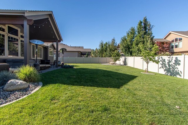 1119 N River Ridge Blvd, Spokane, WA 99224 - fenced backyard featuring a patio