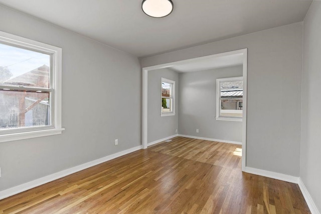 5130 N Stevens St, Spokane, WA 99205 - empty room with wood finished floors and baseboards