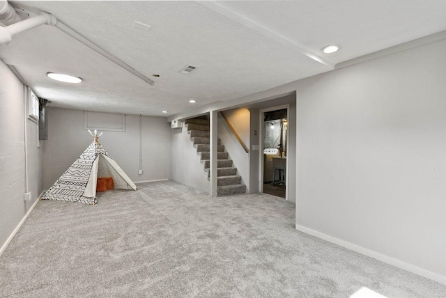 5130 N Stevens St, Spokane, WA 99205 - finished below grade area featuring stairs, carpet floors, recessed lighting, and a textured ceiling
