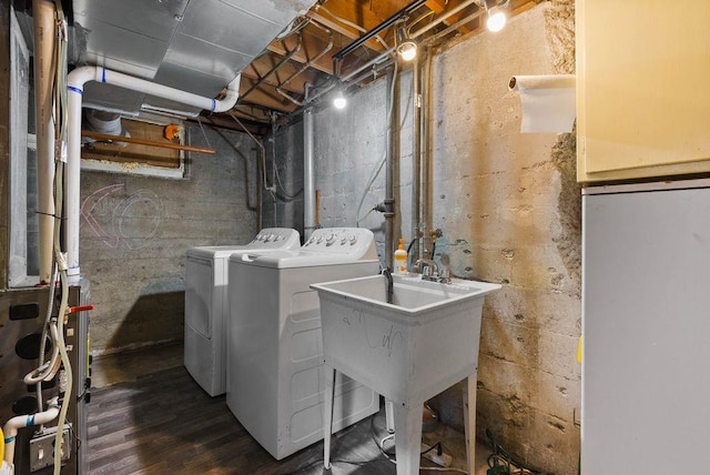 5130 N Stevens St, Spokane, WA 99205 - washroom with washer and dryer and wood finished floors