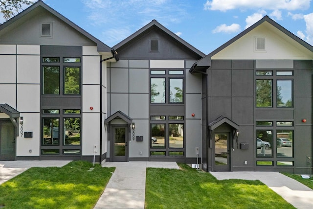 2009 W 9th Ave, Spokane, WA 99204 - view of front of home with a front lawn and stucco siding
