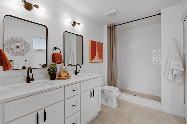 2009 W 9th Ave, Spokane, WA 99204 - bathroom with double vanity and tiled shower