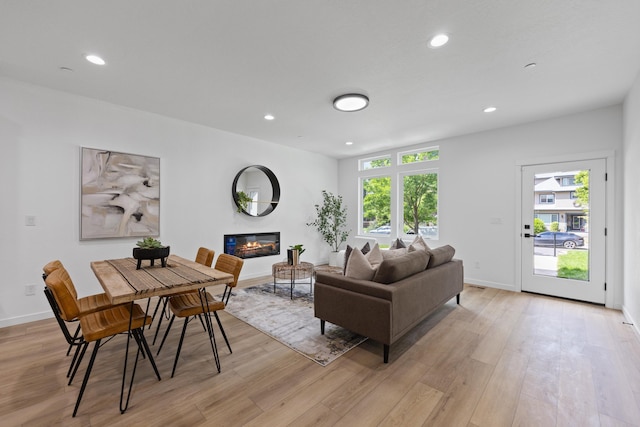 2009 W 9th Ave, Spokane, WA 99204 - living area with a glass covered fireplace, recessed lighting, and light wood-style floors