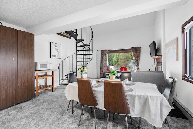 28600 N Mt Spokane Park Dr # 632, Mead, WA 99021 - dining area with stairs, carpet flooring, and a textured ceiling