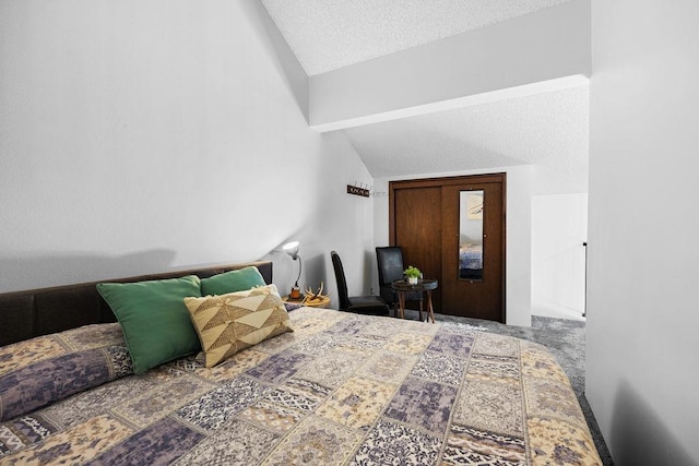 28600 N Mt Spokane Park Dr # 632, Mead, WA 99021 - bedroom featuring vaulted ceiling and a textured ceiling