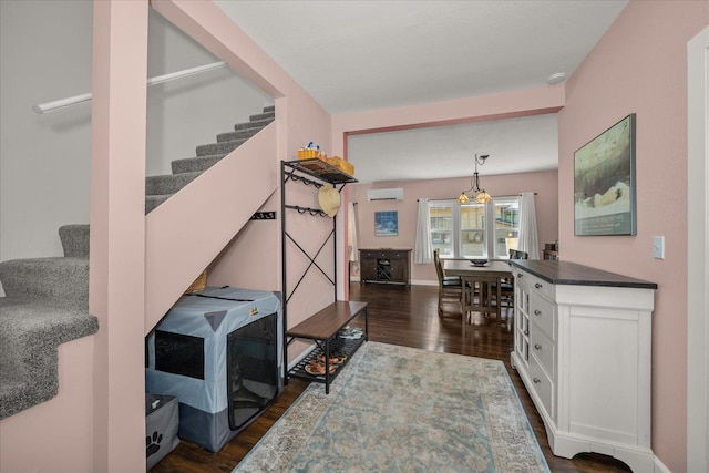 337 E 20th Ave, Spokane, WA 99203 - living area featuring stairs, dark wood-style floors, and a wall unit AC