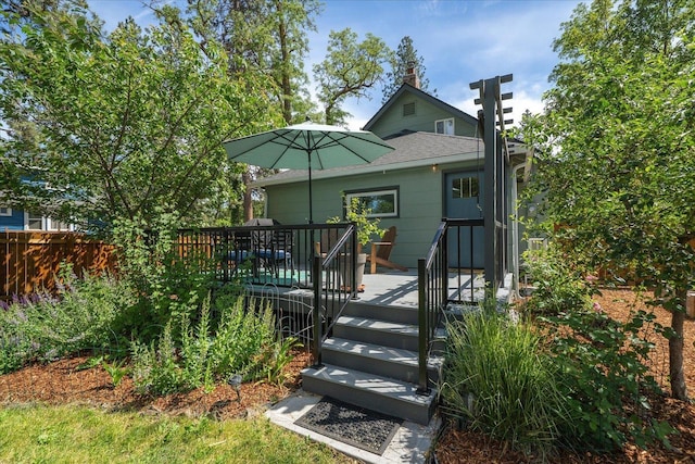 337 E 20th Ave, Spokane, WA 99203 - rear view of property with a wooden deck and roof with shingles