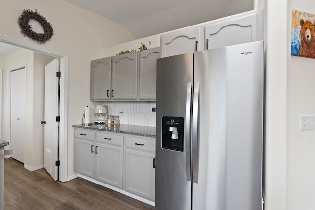 3205 S Mcdonald St, Spokane Valley, WA 99206 - kitchen featuring stainless steel fridge, dark wood-style flooring, lofted ceiling, and dark stone counters