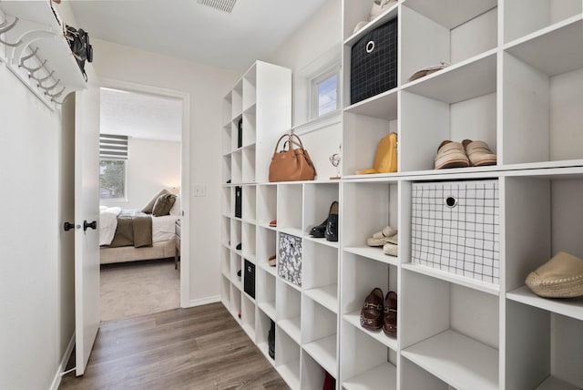 3205 S Mcdonald St, Spokane Valley, WA 99206 - walk in closet featuring wood finished floors