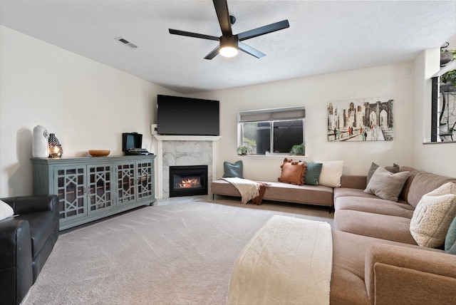 3205 S Mcdonald St, Spokane Valley, WA 99206 - carpeted living room featuring a ceiling fan and a high end fireplace