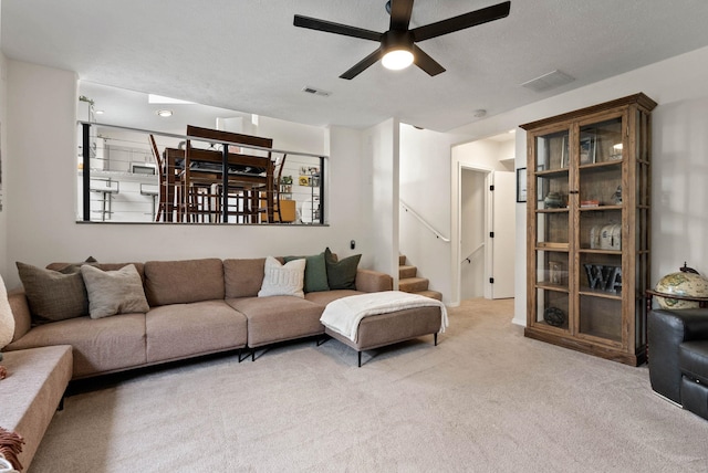 3205 S Mcdonald St, Spokane Valley, WA 99206 - carpeted living room featuring ceiling fan and stairs