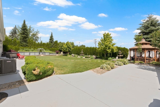 3205 S Mcdonald St, Spokane Valley, WA 99206 - view of grassy yard featuring a gazebo and a patio area
