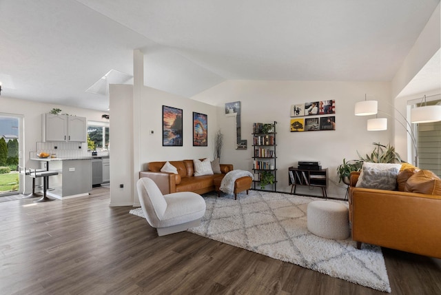 3205 S Mcdonald St, Spokane Valley, WA 99206 - living room featuring dark wood-type flooring and vaulted ceiling