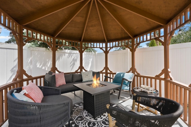 3205 S Mcdonald St, Spokane Valley, WA 99206 - wooden terrace with a gazebo, a fenced backyard, an outdoor living space with a fire pit, and a patio