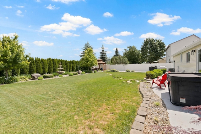 3205 S Mcdonald St, Spokane Valley, WA 99206 - view of yard with a hot tub, a gazebo, and a patio