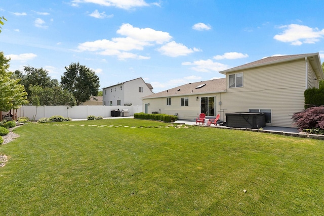 3205 S Mcdonald St, Spokane Valley, WA 99206 - rear view of property featuring a patio and a hot tub