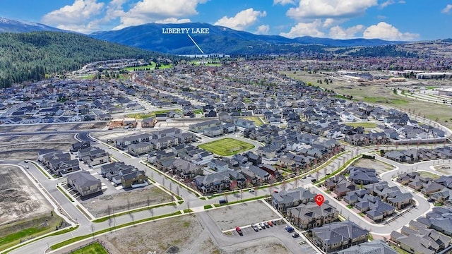 24493 E Pinnacle Ct # D, Liberty Lake, WA 99019 - aerial view of residential area with mountains